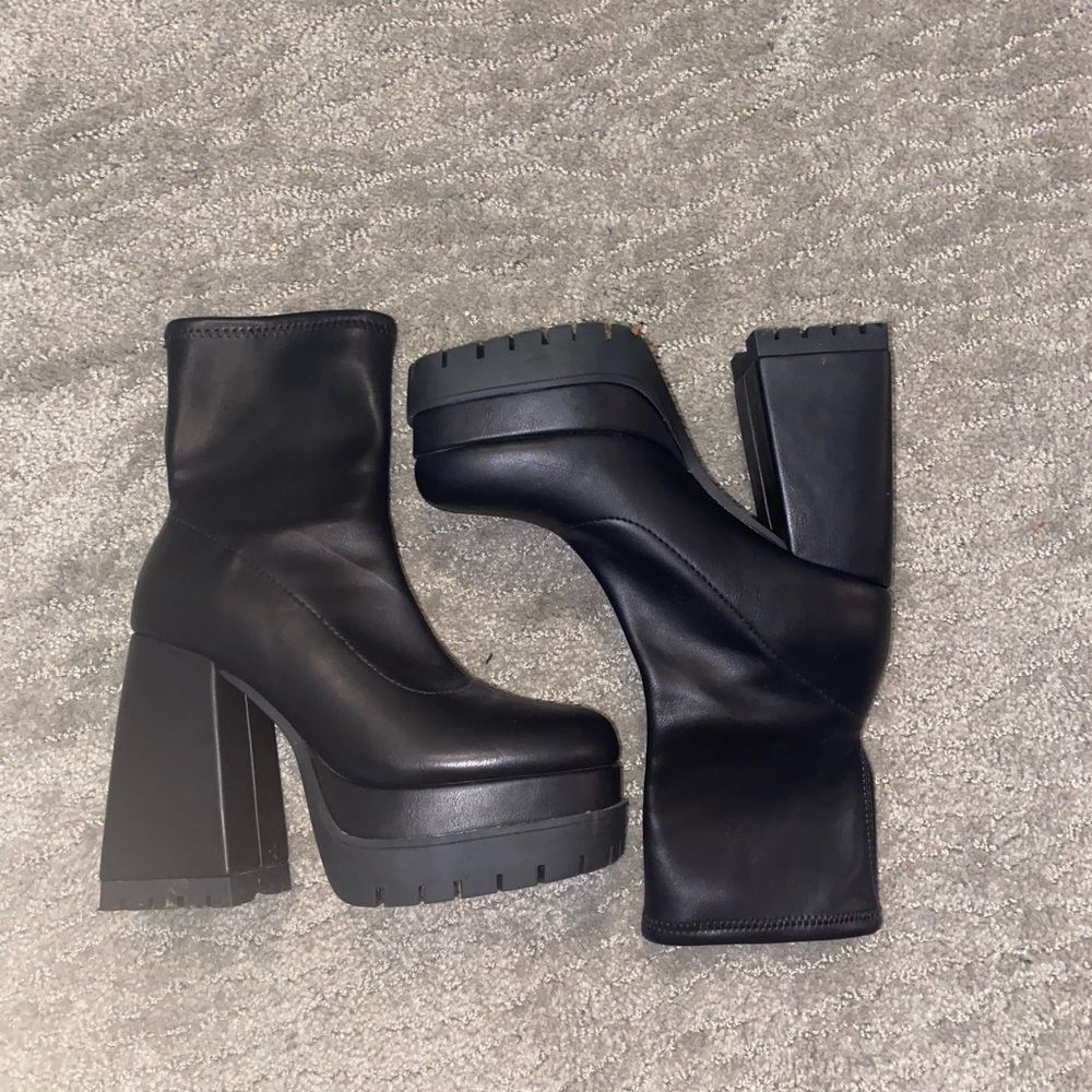 Black platform mid rise heels from call it spring.